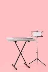 Poster - Modern synthesizer and stand with notes on pink background