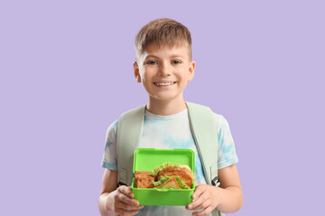 Poster - Little boy with school lunchbox on lilac background