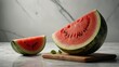 © juanpablo - watermelon on marble cutting board