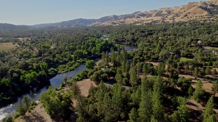 Sticker - flying over a river in california 