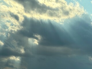 sun shining through clouds