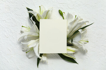 Canvas Print - Composition with blank card and beautiful lily flowers on light background