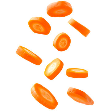 Floating sliced carrot pieces on a transparent background