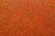 © Sunlight - Shiny orange glitter texture background