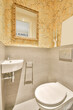 © ADDICTIVE STOCK - Modern bathroom interior with elegant wallpaper and fixtures