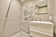 © ADDICTIVE STOCK - Modern bathroom interior with walk-in shower