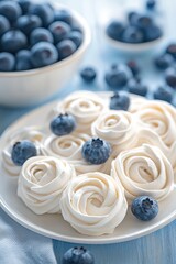 Wall Mural - On a stone background is a Pavlova cake filled with berries and a meringue dessert