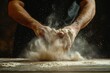 © Maxim Borbut - A man is preparing bread dough at a bakery table made of wood
