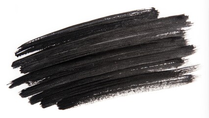 Black paint is applied with a brush on a white background