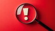 © Elchin Abilov - View through a magnifying glass on an exclamation mark over a red background An attentiongrabbing image that represents warnings or caution ideal for safety or alert themes