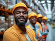 © TRINETTE + CHRIS - Group portrait of Warehouse workers in warehouse