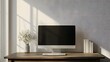 © cynz - A portrait photo of a sleek, clutter-free desk with a computer monitor and nothing else, highlighting the simplicity of the workspace.