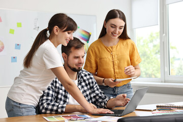 Canvas Print - Group of designers working together in office