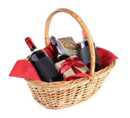 Canvas Print - Wicker gift basket with wine isolated on white