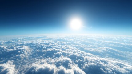 Wall Mural - A serene aerial view above light clouds, the sky a vibrant deep blue