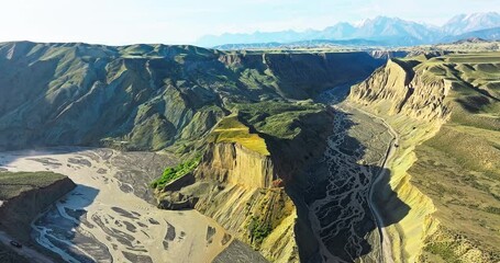 Wall Mural - Spectacular Anjihai Grand Canyon natural landscape in Xinjiang. Famous earthquake fault zone scenery in China. Aerial view of mountain faults and canyon rivers.