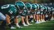 © nuiiko - Unity spirit partnership and athletics concept. A team of football players in green uniforms assumes a competitive stance on the field, ready for action during a game.