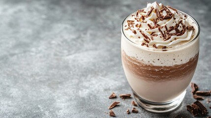 Sticker - Chocolate milkshake with whipped cream and chocolate shavings on a grey background.