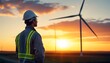 © 克 杜 - Engineer assessing wind turbine structural integrity against a stunning sunset backdrop, ensuring optimal machinery performance and safety
