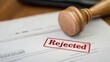 © Borin - a 'Rejected' stamp on a document or application form.
