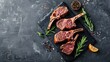 © NeuralNiche - Sliced lamb and roasted mutton leg steaks on gray surface top view with copy space