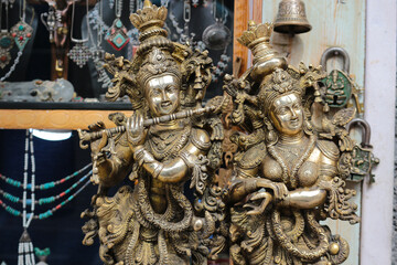 Wall Mural - Bronze figures of the Indian god Krishna and Radha.