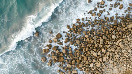 Wall Mural - Aerial View of Rocky Shoreline and Waves