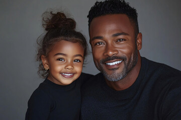 Wall Mural - Mixed racial Father and cute daughter smiling and interacting in front of a plain background, dressed in simple clothes, captured in a family photo portrait shoot showcasing their joyful bond