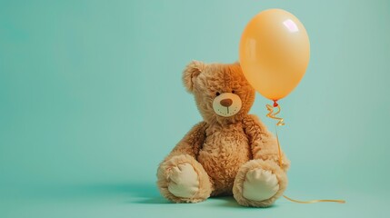 Poster - A brown teddy bear sitting on a light blue background, holding a yellow balloon.