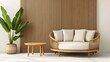 © Prim2513 - Modern living room featuring a round wooden sofa with neutral cushions, a potted indoor plant, and a minimalist wooden accent wall, creating a cozy and natural atmosphere.