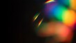 © Artfinity - Blur colorful rainbow crystal light leaks on a black background. Defocused abstract multicolored retro film lens flare bokeh analog photo overlay.