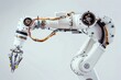 © Татьяна Евдокимова - Detailed view of a white industrial robot arm with exposed wires and joints, showcasing its advanced technology