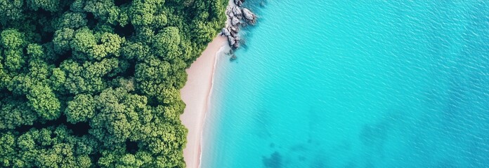 Wall Mural - A beautiful blue ocean with a rocky shoreline