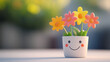 © Ratchpon - small 3D flower pot with smiling face holds vibrant flowers, bringing joy and cheer to any space. This delightful decoration adds touch of whimsy and happiness