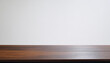 © Ahmad As Shiddiqi - Wooden tabletop with a white wall, offering a clean and simple backdrop for product display.
