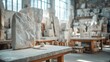 © Suphakorn - An artist's workshop filled with stone sculptures and tools, showcasing the beauty of craftsmanship and creativity in stone carving.