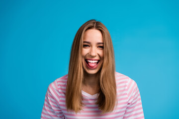 Poster - Photo portrait of good mood cute woman wear stylish striped pink clothes isolated on blue color background