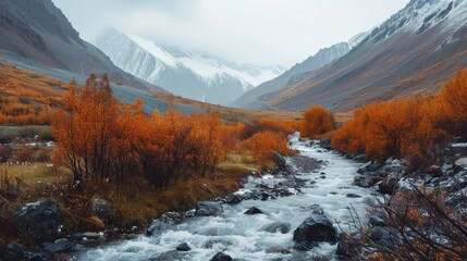 A serene mountain landscape adorned with vibrant autumn foliage and snow-capped peaks, with a gentle stream flowing through the valley.