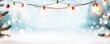 © Rossarin - Winter holiday scene with Christmas lights and snow, festive atmosphere, white background.