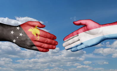 Luxembourg and Papua New Guinea country handshaking with flags, consensus concept international co-operation illustration