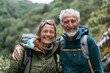 © CogniLens - Portrait of a smiling couple in their 70s going on a hike in nature