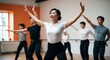 © Arceli - Joyful young Asian dancer in a studio practicing a routine