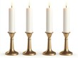 © JP STUDIO LAB - A set of brass candlesticks holding tall white candles, flickering softly in the evening isolated on white background.