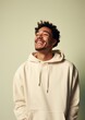 © Rawpixel.com - A happy mixed race british man wear cream hoodie sweatshirt laughing adult.