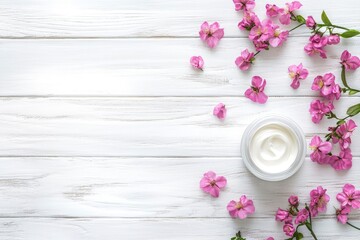 Wall Mural - Cosmetic cream container and pink flowers on white wooden background from top view - generative ai