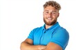 © typepng - In a blue polo shirt with crossed arms, a young European man is shown smiling and looking at the camera in this portrait.