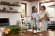 © peopleimages.com - Dance, love and mature couple in kitchen for bonding, loving relationship and romance together in home. Retirement, marriage and happy man and woman with wine for cooking meal, lunch and dinner