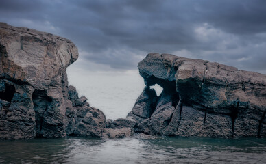 Big rocks under a cloud sky