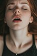 © Artem Zatsepilin - moaning young sensual caucasian woman with open mouth and closed eyes getting sexual pleasure, orgasm, top view portrait. erotic, sex, masturbation and cunnilingus.
