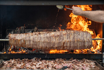 Wood fired Turkish Cag Kebab Doner. Cag kebab, a traditional Turkish cuisine dish made from lamb meat cooked on wood fire